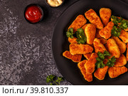 Chicken naggets with sauces on dark background. Стоковое фото, фотограф Татьяна  Бральнина / Фотобанк Лори