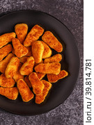 Chicken naggets with sauces on dark background. Стоковое фото, фотограф Татьяна  Бральнина / Фотобанк Лори
