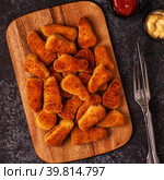 Chicken naggets with sauces on dark background. Стоковое фото, фотограф Татьяна  Бральнина / Фотобанк Лори