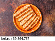 Sliced fresh raw tempeh, traditional Indonesian food. Стоковое фото, фотограф Татьяна  Бральнина / Фотобанк Лори