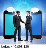 Concept of communication with businessmen handshaking. Стоковое фото, фотограф Elnur / Фотобанк Лори