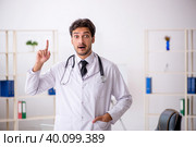 Young male doctor working in the clinic. Стоковое фото, фотограф Elnur / Фотобанк Лори