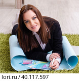 Female designer working in the office. Стоковое фото, фотограф Elnur / Фотобанк Лори