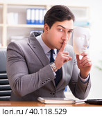 Businessman with mask in office hypocrisy concept. Стоковое фото, фотограф Elnur / Фотобанк Лори