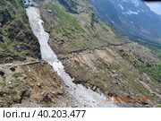 Kedarnath trek route passing through frozen river in Himalaya. Стоковое фото, фотограф Devendra Rawat / Фотобанк Лори