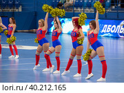 Выступление команды черлидеров во время матча по гандболу в группе А Суперлиги "Олимпбет" 2022/23 между женскими командами ЦСКА (Москва. Россия) и "Астраханочка" (Астрахань). Россия). Стадион Динамо (2023 год). Редакционное фото, фотограф Pukhov K / Фотобанк Лори