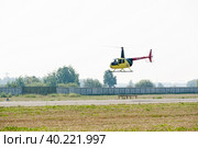Pilot of Robinson R44 Raven on airshow (2012 год). Редакционное фото, фотограф Сергей Буторин / Фотобанк Лори