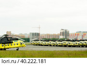 A line of retired old helicopters of UTair company (2019 год). Редакционное фото, фотограф Сергей Буторин / Фотобанк Лори
