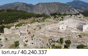 Bird's eye view of Rhodiapolis remains, near Kumluca in Antalya Province, Turkey. Стоковое видео, видеограф Яков Филимонов / Фотобанк Лори
