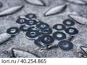 PIle of shiny screw washers. Стоковое фото, фотограф Корнеев Вячеслав / Фотобанк Лори