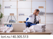 Young male employee in rejected ideas concept. Стоковое фото, фотограф Elnur / Фотобанк Лори