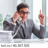 Call center operator talking on the phone. Стоковое фото, фотограф Elnur / Фотобанк Лори