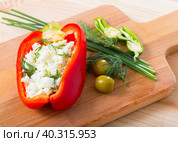Image of pepper stuffed with brynza in plate. Стоковое фото, фотограф Яков Филимонов / Фотобанк Лори