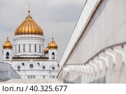 The Russian Orthodox Cathedral is the Cathedral of Christ the Savior in Moscow on a spring day. Russian Federation, Moscow. (2023 год). Редакционное фото, фотограф Photojuli / Фотобанк Лори