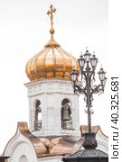 The Russian Orthodox Cathedral is the Cathedral of Christ the Savior in Moscow on a spring day. Russian Federation, Moscow. (2023 год). Редакционное фото, фотограф Photojuli / Фотобанк Лори