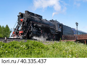 Совесткий магистральный грузовой паровоз Л-4429 (Лебедянка) крупным планом солнечным июньским днем. Станция Сортавала-Центр, Карелия (2022 год). Редакционное фото, фотограф Виктор Карасев / Фотобанк Лори