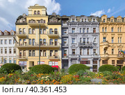 Old beautiful buildings on Tepla river embankment in Karlovy Vary. Czech republic (2018 год). Редакционное фото, фотограф Belikart / Фотобанк Лори