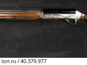 Smoothbore hunting gun on black background close up. Стоковое фото, фотограф Сергей Толмачёв / Фотобанк Лори