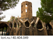 Exterior view of guell crypt, masterpiece gaudi architecture located at catalunya outside town. Стоковое фото, фотограф Яков Филимонов / Фотобанк Лори