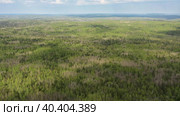 Южный Урал весной, вид на горную тайгу с воздуха. Southern Urals in spring, a view of the mountain taiga from the air. Стоковое видео, видеограф Евгений Романов / Фотобанк Лори