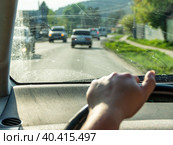 view from behind the wheel of a dirty windshield, selective focus. Стоковое фото, фотограф Дмитрий Коростылев / Фотобанк Лори