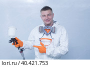 Portrait of a car mechanic. An auto mechanic is engaged in painting cars. Стоковое фото, фотограф Александр Поташев / Фотобанк Лори