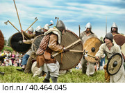 Russia, Staraya Ladoga 23,06,2012 Reenactors with shields and spears during the battle, the festival of historical reconstruction "Pages of History" Редакционное фото, фотограф Анна Кривицкая / Фотобанк Лори