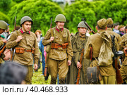Soldiers in military uniform of the second world war at the historical reconstruction to the Day of the Border Guard. Стоковое фото, фотограф Анна Кривицкая / Фотобанк Лори
