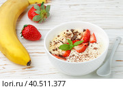 Traditional healthy Breakfast. Natural yogurt with strawberries, banana and chocolate. Selective focus. Стоковое фото, фотограф Виктория Панченко / Фотобанк Лори