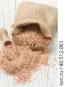 Raw Organic Devzira Rice on a white table. Стоковое фото, фотограф Виктория Панченко / Фотобанк Лори