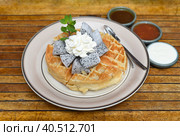 Plate of Belgium waffles with dragon fruit and ice cream on wooden table. Стоковое фото, фотограф Татьяна Терехина / Фотобанк Лори