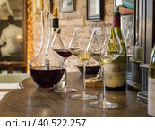 Vintage wine poured into glasses and decanter. Стоковое фото, фотограф Саблин Станислав / Фотобанк Лори