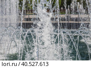 Light and music fountain on a spring morning. Natural Museum-reserve "Tsaritsyno". Fountain in Tsaritsyno Park. (2023 год). Редакционное фото, фотограф Photojuli / Фотобанк Лори