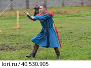 Festival of medieval reconstruction "Russian fortress", Fencing on swords in medieval costumes (2015 год). Редакционное фото, фотограф Анна Кривицкая / Фотобанк Лори