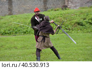 Festival of medieval reconstruction "Russian fortress", Fencing on swords in medieval costumes (2015 год). Редакционное фото, фотограф Анна Кривицкая / Фотобанк Лори