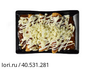 Chilaquiles with chicken and sour cream and sauce with many vegetables on white background. Стоковое фото, фотограф Татьяна Терехина / Фотобанк Лори