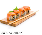 Various types of sushi and rolls on a white background. Created by AI. Стоковое AI-изображение, AI-художник Ярославский Максим / Фотобанк Лори
