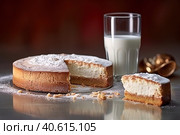 Biscuit cake with powdered sugar and a glass of milk. Generative AI. Стоковое AI-изображение, AI-художник Юрий Поздников / Фотобанк Лори