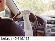 A man driving a Toyota, view from the passenger compartment. Safe driving. Стоковое фото, фотограф Коханова Наталья / Фотобанк Лори