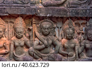 Apsara carved on the wall of the Elephant terrace, Angkor Thom. cambodia. (2017 год). Редакционное фото, фотограф Анна Кривицкая / Фотобанк Лори