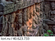 Apsara carved on the wall of the Elephant terrace, Angkor Thom. cambodia. (2017 год). Редакционное фото, фотограф Анна Кривицкая / Фотобанк Лори