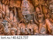 Apsara carved on the wall of the Elephant terrace, Angkor Thom. cambodia. (2017 год). Редакционное фото, фотограф Анна Кривицкая / Фотобанк Лори