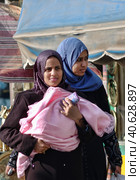 Egypt, Hurghada, 17,01,2009 A woman in a burqa in the streets of Egypt. Редакционное фото, фотограф Анна Кривицкая / Фотобанк Лори