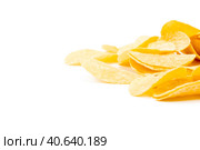 yellow potato chips isolated on white. Стоковое фото, фотограф Сергей Толмачёв / Фотобанк Лори