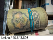 Советские рубли, свернутые в трубочку, денежный фон ретро/ Money background from old banknotes of the USSR. Soviet rubles. Стоковое фото, фотограф Iva Noel / Фотобанк Лори