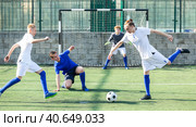Junior football teams having scrimmage. Стоковое фото, фотограф Яков Филимонов / Фотобанк Лори