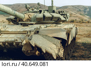 Russian battle tanks at tankodrome in mountains. Стоковое фото, фотограф Сергей Толмачёв / Фотобанк Лори