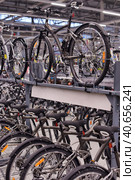 Russia, St. Petersburg 09,03,2015Bicycles for sale in a sporting goods store. Редакционное фото, фотограф Анна Кривицкая / Фотобанк Лори