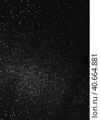 Black bokeh texture on black background. White glitter or illuminated dust. Стоковое фото, фотограф Юлия Петровская / Фотобанк Лори