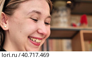 Portrait of a young Millennial Female crying with unexpected happiness, wipes tears of joy. Millenial girl looking happy enjoying freedom contemplating spiritual journey. Стоковое видео, видеограф Сахарова Мария Юрьевна / Фотобанк Лори
